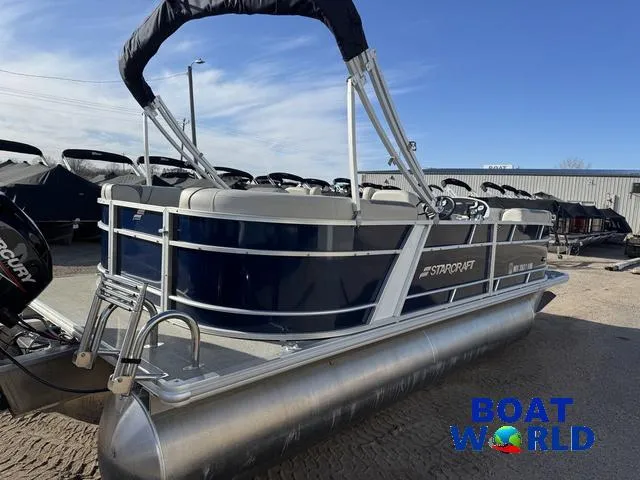 Slide: The Image of 2021 Starcraft EX 20 R Pontoon boat in a marina setting, featuring sleek design and modern amenities. - 32