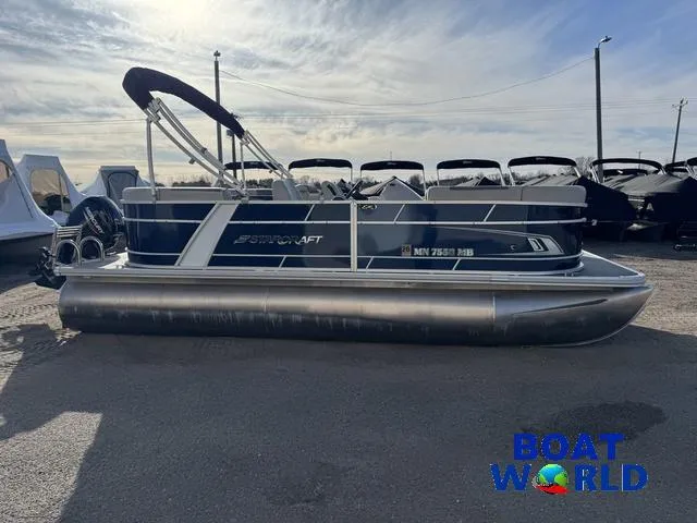 Slide: The Image of 2021 Starcraft EX 20 R Pontoon boat parked outdoors at Boat World dealership. - 35