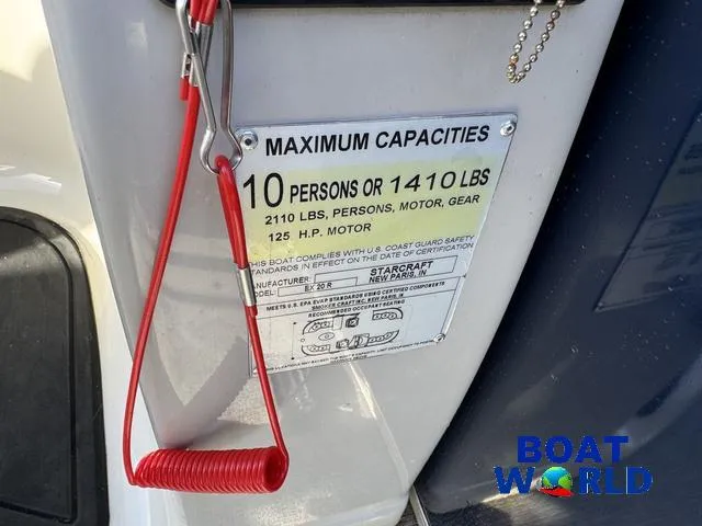 Slide: The Image of 2021 Starcraft EX 20 R Pontoon capacity label, 10 persons or 1410 lbs, 125 HP motor. - 39