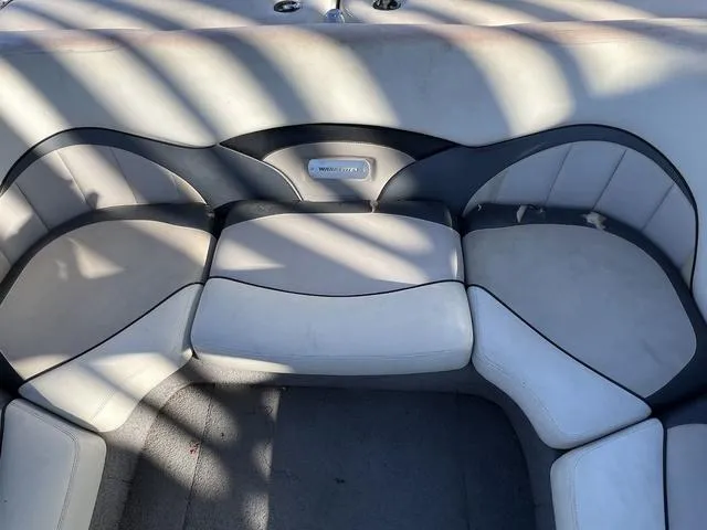 Slide: The Image of 2009 Malibu Wakesetter 23 LSV boat interior seating area. - 13