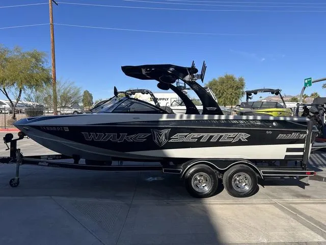 Slide: The Image of 2009 Malibu Wakesetter 23 LSV boat on trailer, side view, outdoors. - 6