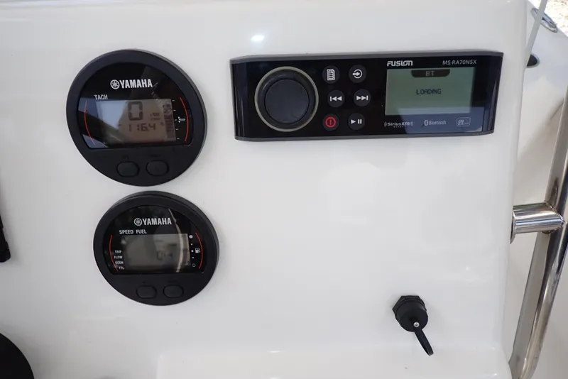 Slide: The Image of Dashboard of 2022 Key West 188 Bay Reef boat with Yamaha gauges and Fusion stereo. - 12