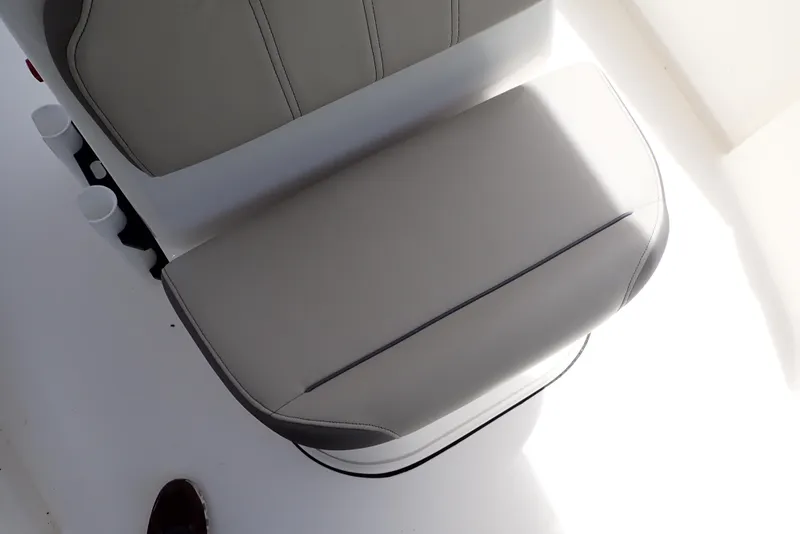 Slide: The Image of 2022 Key West 188 Bay Reef boat seat, gray upholstery, top view. - 26
