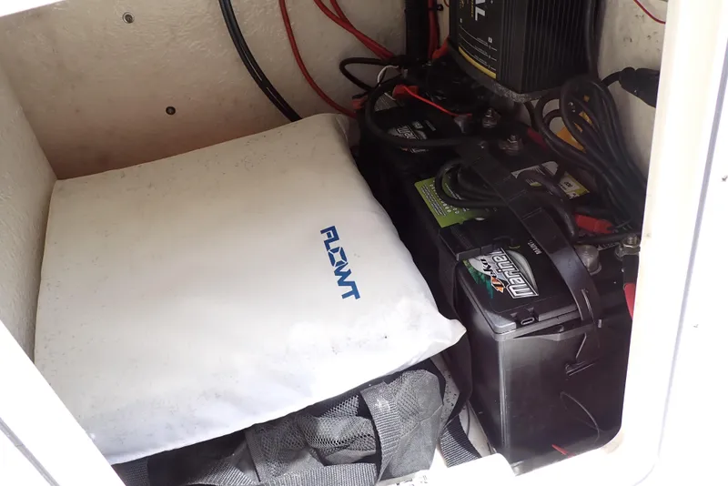 Slide: The Image of Battery compartment of 2022 Key West 188 Bay Reef boat with wiring and accessories. - 29