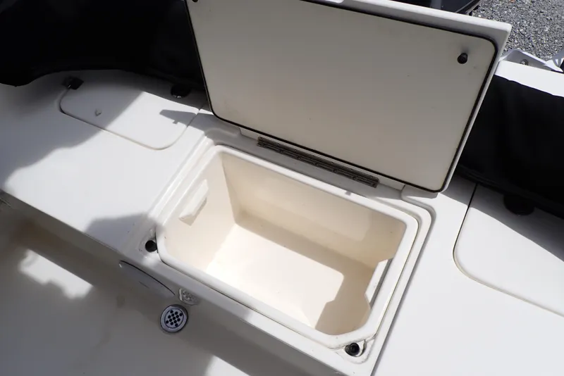 Slide: The Image of Open storage compartment on 2022 Key West 188 Bay Reef boat. - 31