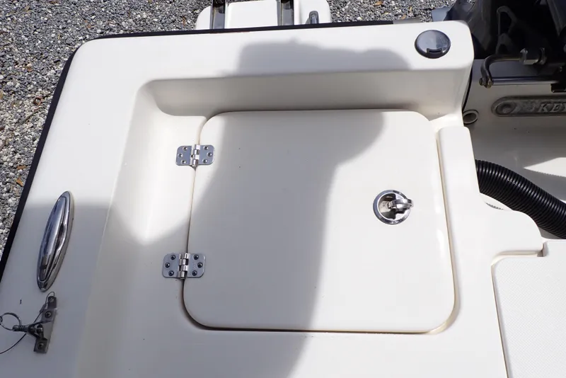 Slide: The Image of 2022 Key West 188 Bay Reef boat deck with storage compartment and latch. - 32