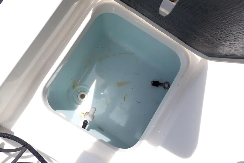 Slide: The Image of Open storage compartment on 2022 Key West 188 Bay Reef boat. - 35