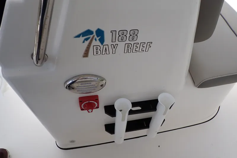 Slide: The Image of 2022 Key West 188 Bay Reef boat console with logo and rod holders. - 36