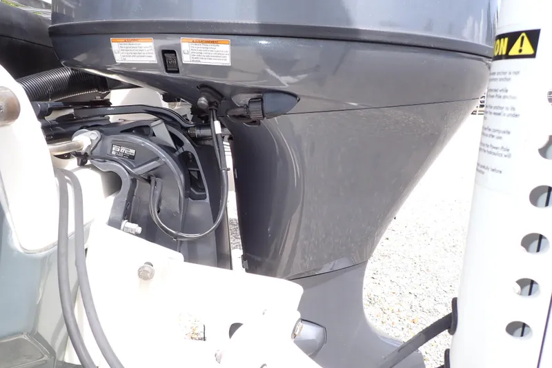 Slide: The Image of 2022 Key West 188 Bay Reef boat engine close-up, showcasing mechanical details. - 46