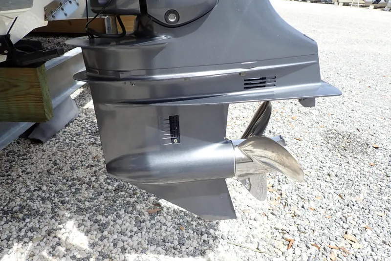 Slide: The Image of Outboard motor of 2022 Key West 188 Bay Reef on gravel surface. - 47