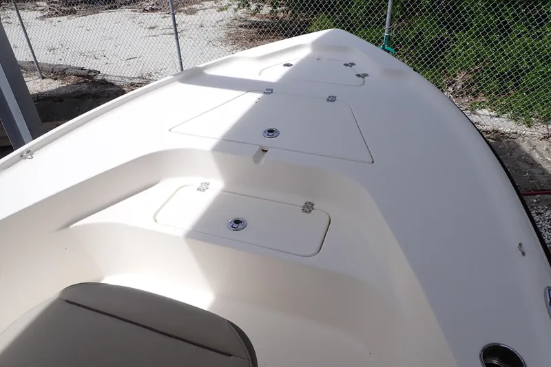 Slide: The Image of 2022 Key West 188 Bay Reef boat deck with storage compartments. - 7