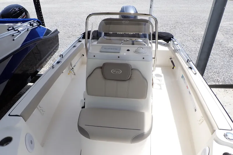 Slide: The Image of 2022 Key West 188 Bay Reef boat interior with seating and console. - 8