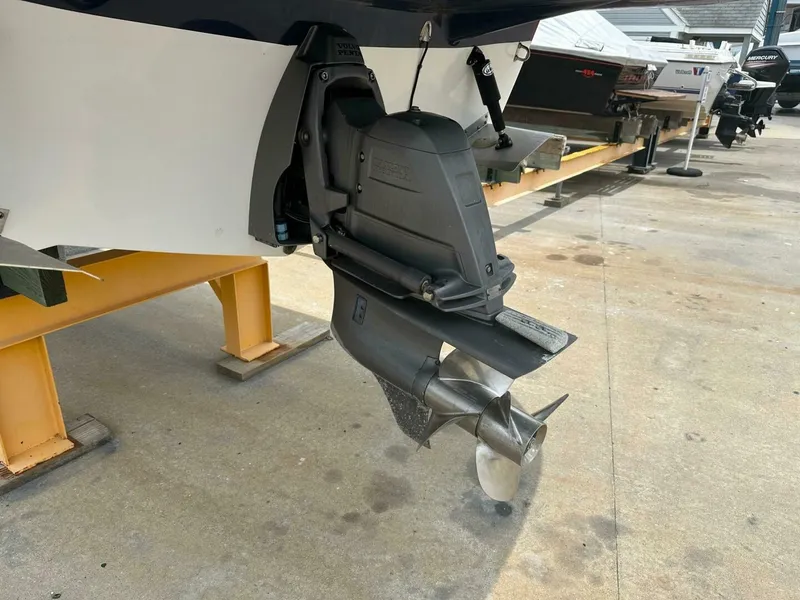 Slide: The Image of 2018 Rinker EX 270 boat propeller and stern drive on display. - 36