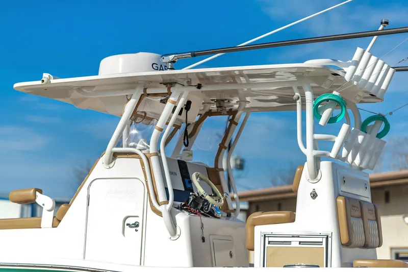 Slide: The Image of 2019 Shallow Sport 32 X3 boat with advanced navigation equipment and rod holders. - 15