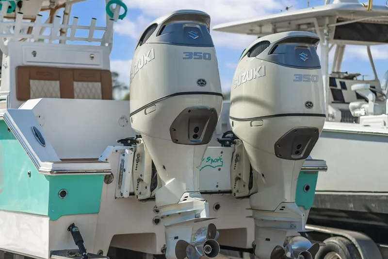 Slide: The Image of 2019 Shallow Sport 32 X3 boat with dual Suzuki 350 outboard engines. - 9