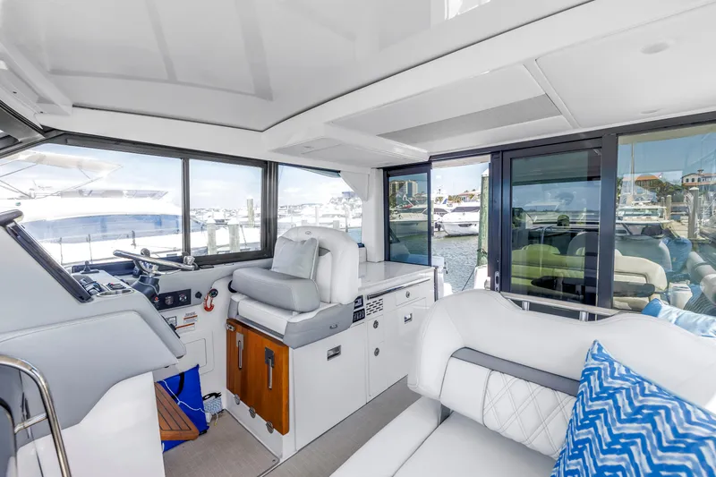 Slide: The Image of Luxurious interior of 2022 Regal 36 XO yacht with modern seating and helm. - 26