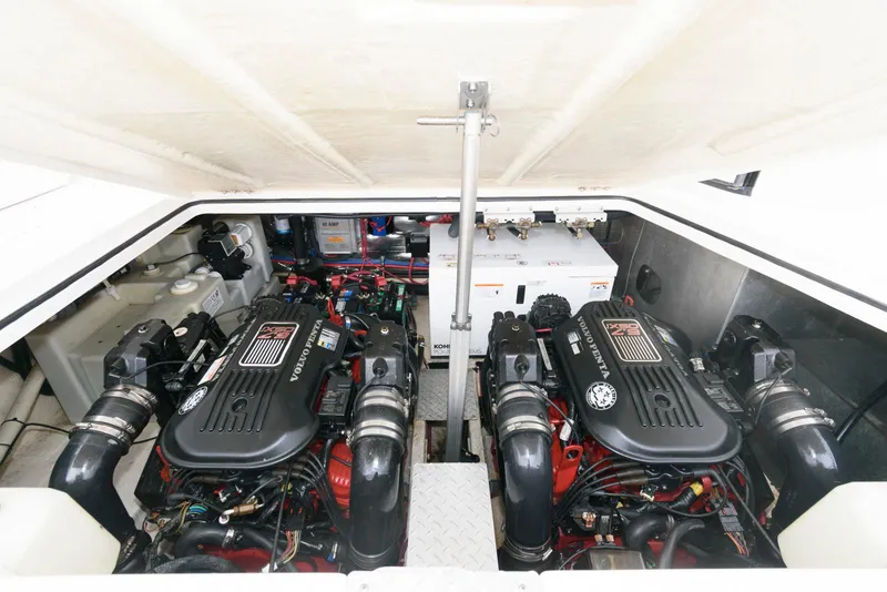 Slide: The Image of Engine compartment of 2007 Regal 3360 Window Express with dual engines and mechanical components. - 17