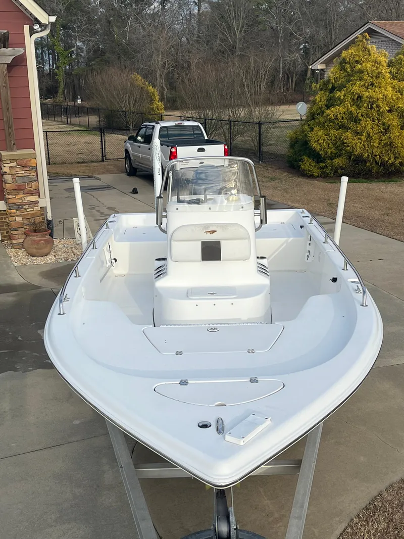 Slide: The Image of 2013 Tidewater 1910 Baymax boat parked in driveway, front view. - 4