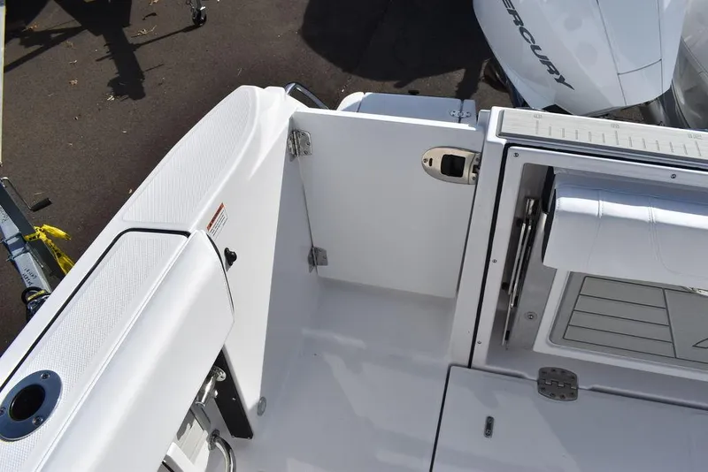 Slide: The Image of 2025 Blackfin 252CC boat interior, featuring sleek white design and modern fittings. - 29