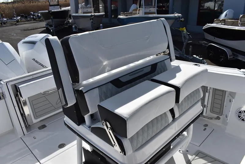 Slide: The Image of 2025 Blackfin 252CC boat seating area with modern design and comfortable upholstery. - 40