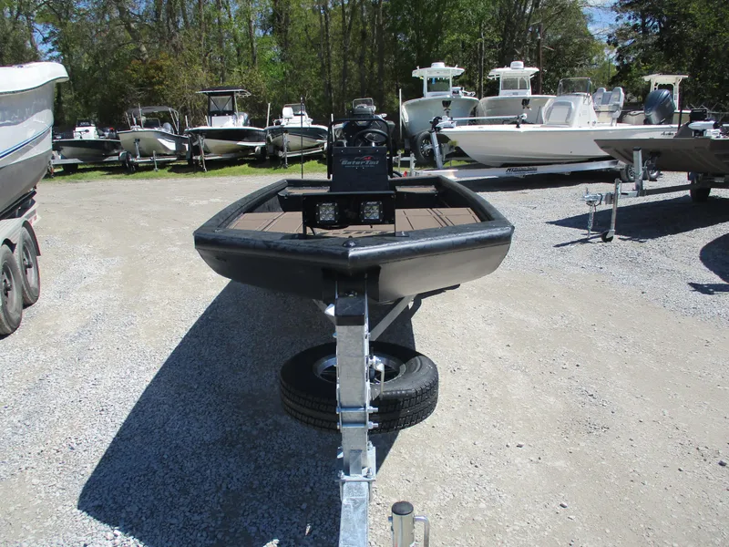 Slide: The Image of 2025 Gator Tail 1860 Extreme CC boat on trailer in outdoor lot. - 1