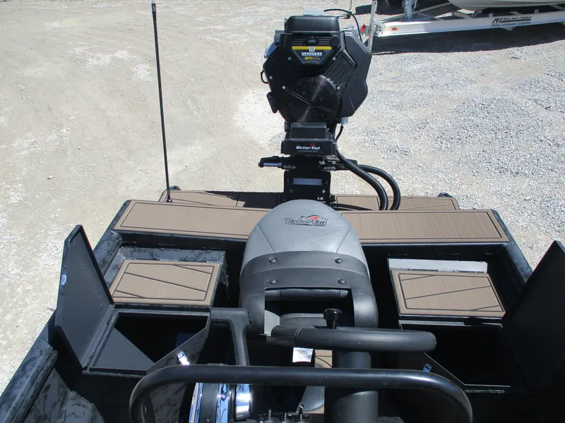 Slide: The Image of 2025 Gator Tail 1860 Extreme CC boat interior with motor and storage compartments. - 5