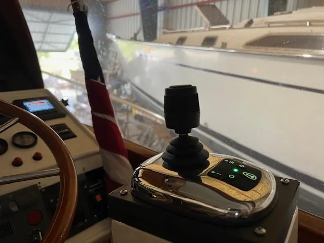 Slide: The Image of Control panel of a 2001 Little Harbor WhisperJet 44 yacht in a marina setting. - 15