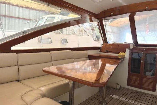 Slide: The Image of Interior of 2001 Little Harbor WhisperJet 44 yacht with elegant wood and leather seating. - 19