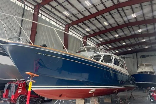 Slide: The Image of 2001 Little Harbor WhisperJet 44 boat in a storage facility. - 6