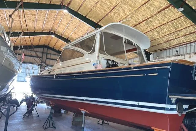 Slide: The Image of 2001 Little Harbor WhisperJet 44 boat in a storage facility. - 7