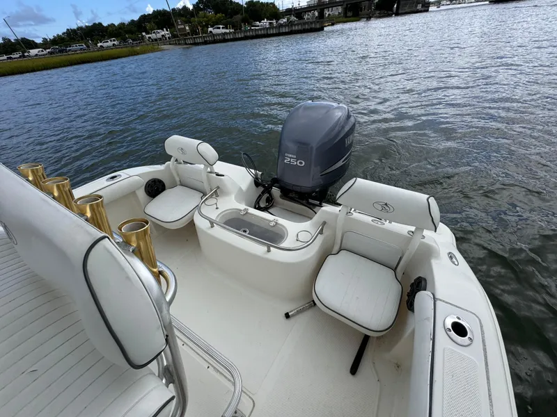 Slide: The Image of 2008 Key West 211 Bluewater boat with Yamaha 250 engine on a calm river. - 7