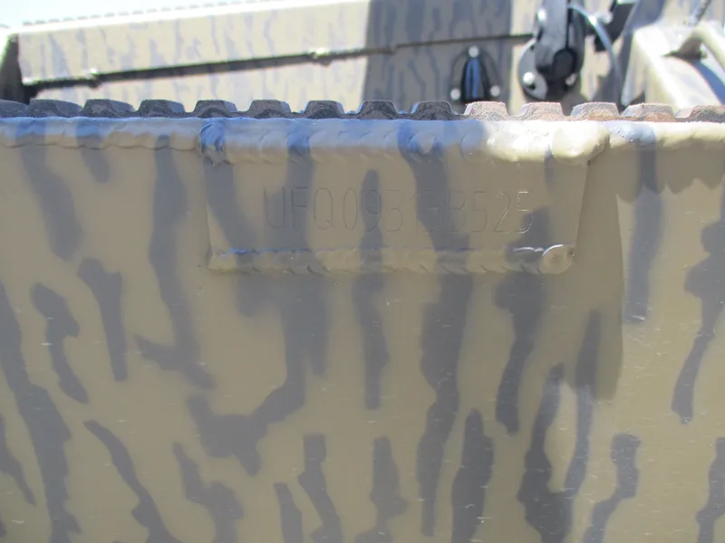 Slide: The Image of 2025 Gator Tail 1750 Savage boat with camouflage pattern detail. - 9