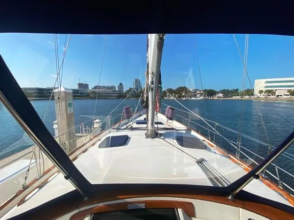 Slide: The Image of 1989 Irwin 54 sailboat docked, city skyline in background, viewed from cockpit. - 22