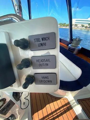 Slide: The Image of Control panel on 1989 Irwin 54 yacht with winch, headsail, and vang switches. - 27