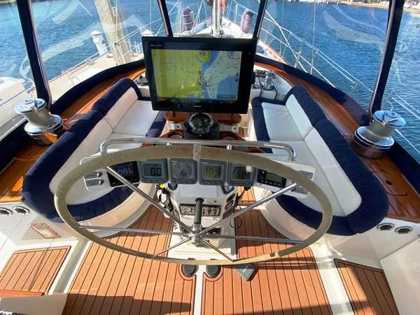 Slide: The Image of Cockpit of 1989 Irwin 54 yacht with navigation equipment and seating. - 31