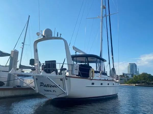 Slide: The Image of 1989 Irwin 54 sailboat docked in Tampa, Florida, under a clear blue sky. - 5
