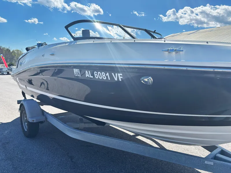Slide: The Image of 2019 Bayliner VF5 boat on trailer under sunny sky. - 5