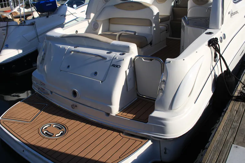 Slide: The Image of 2008 Sea Ray Sundancer yacht with spacious deck and seating area. - 13