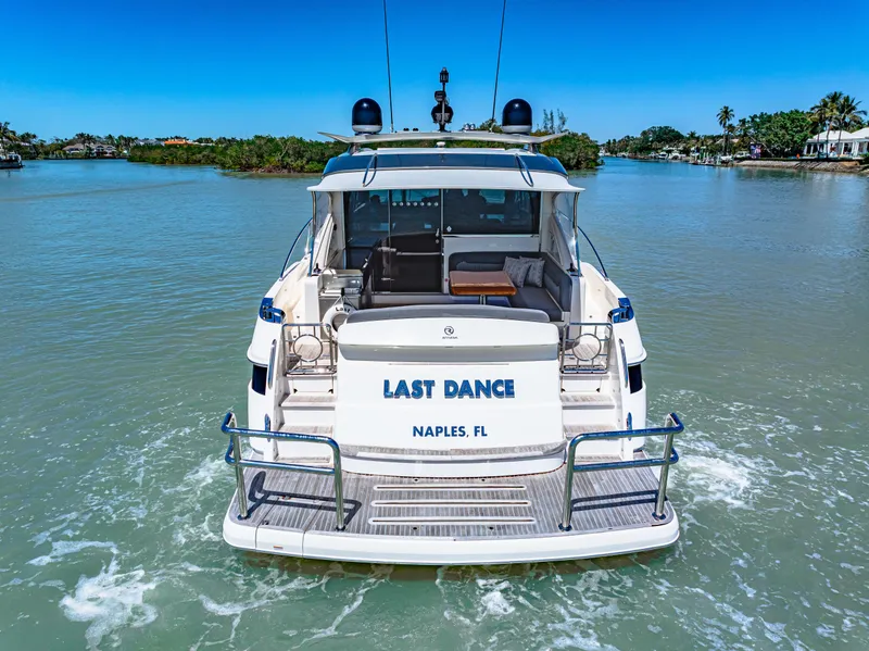 Slide: The Image of 2022 Riviera 5400 Sport Yacht cruising in Naples, FL waters. - 11