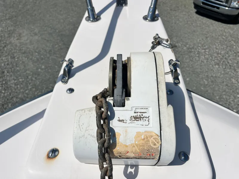 Slide: The Image of Bow of 2003 Grady-White Chase 273 with anchor windlass and chain. - 11