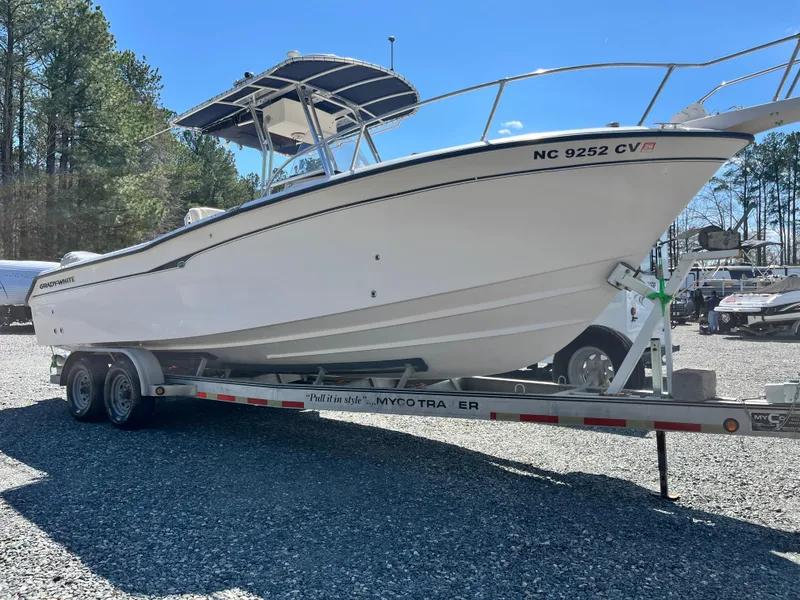 Slide: The Image of 2003 Grady-White Chase 273 boat on trailer, parked outdoors. - 4