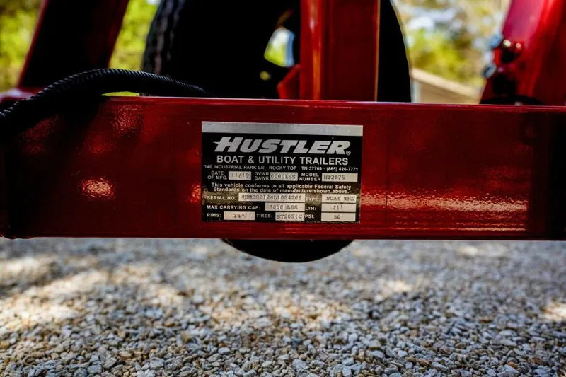 Slide: The Image of Red Hustler boat trailer with label, suitable for 1941 Hacker-Craft Deluxe. - 31