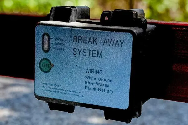 Slide: The Image of 1941 Hacker-Craft Deluxe breakaway system wiring box with instructions and test button. - 32