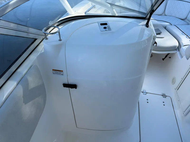 Slide: The Image of 2020 Sea Fox 226 Traveler boat interior with white console and seating. - 17