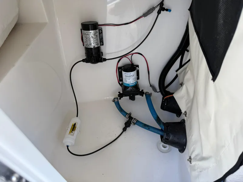 Slide: The Image of Boat interior wiring and pump system in a 2020 Sea Fox 226 Traveler. - 20