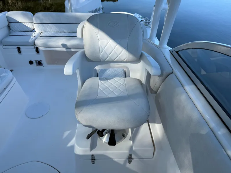 Slide: The Image of 2020 Sea Fox 226 Traveler boat with cushioned seating and sleek design. - 9