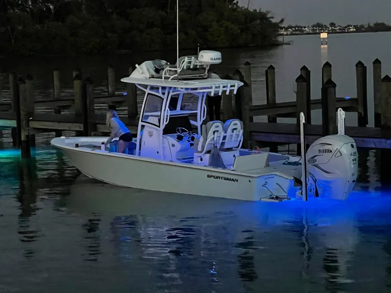 Slide: The Image of 2020 Sportsman Masters 267 Bay Boat illuminated at dock during evening. - 5