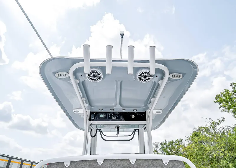Slide: The Image of 2025 Sea Hunt Ultra 275 SE boat top view with rod holders and speakers. - 12