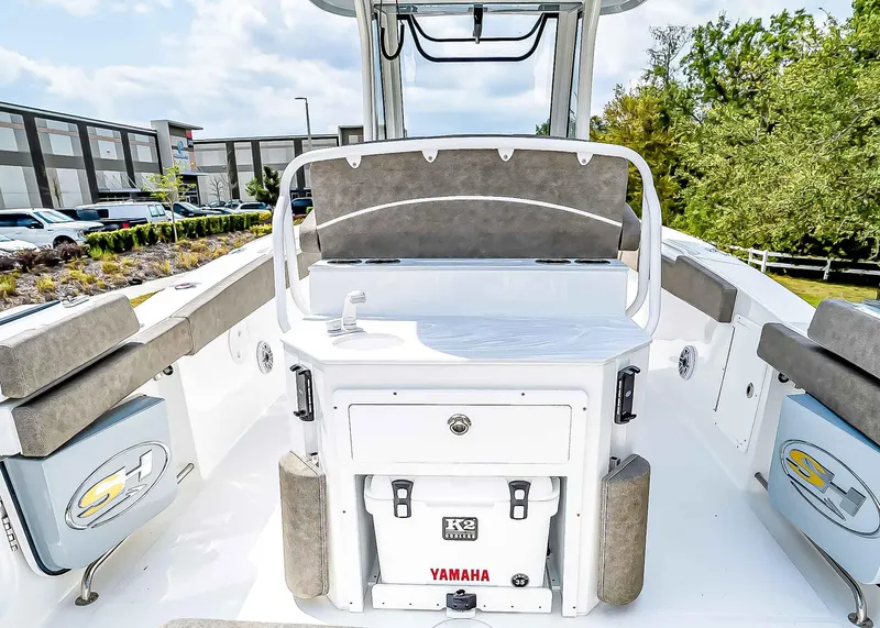 Slide: The Image of 2025 Sea Hunt Ultra 275 SE boat interior with seating and storage. - 9