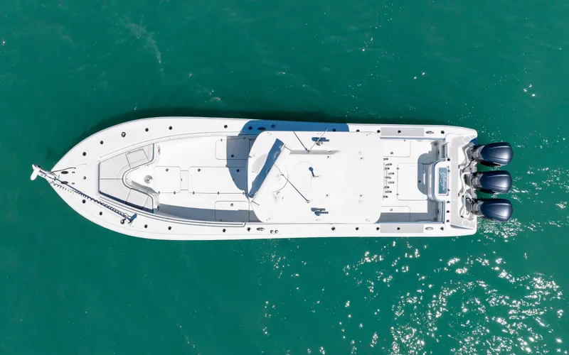 Slide: The Image of Aerial view of 2019 Yellowfin 36 boat on turquoise water. - 17